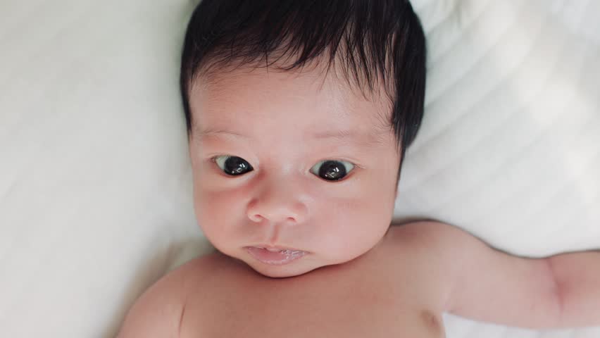 Closeup of a baby sleep on the bed 