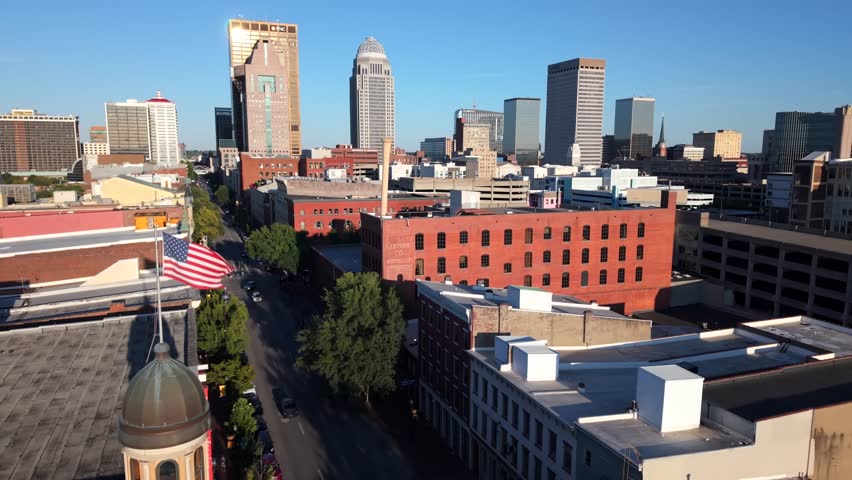Ascending Aerial Shot Of Downtown Louisville City Skyline And Streets In Kentucky, USA.