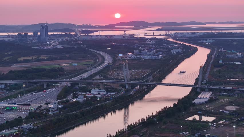 Sunset at the Gyeongin Ara Waterway and Incheon International Airport Expressway tollgates in Incheon