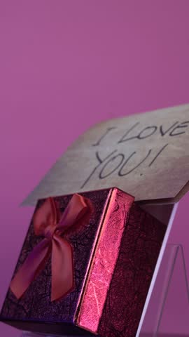 Vertical View of Red Gift Box and I Love You Message For Valentines Day