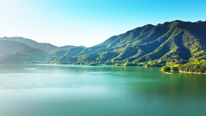 Aerial view of the blue lake and green mountain natural landscape in summer