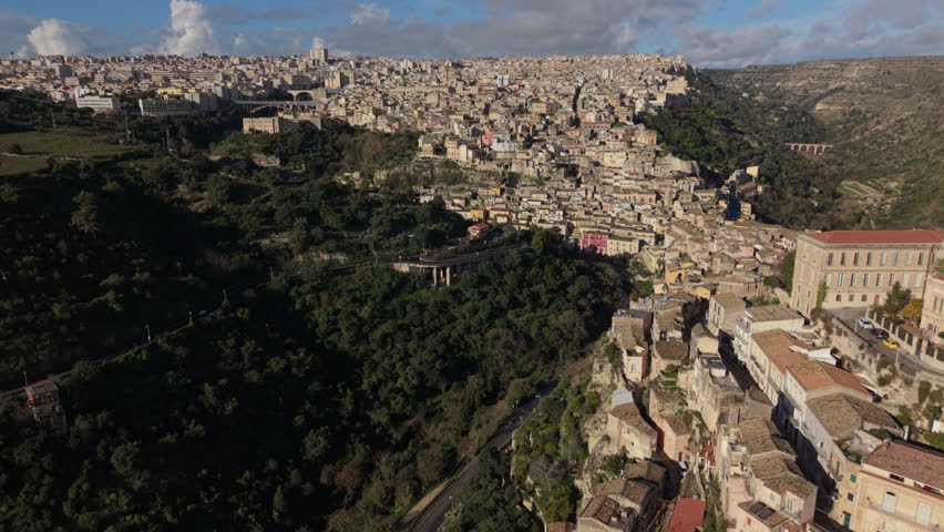 flying back reveal of Ragusa Ibla in Sicily