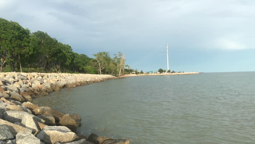 The scenery of sea from beach side. Blue sky with cloudy. 