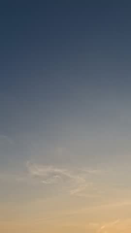 Sunset go down golden deep blue sky in New Year,cool breeze,soft cloud,January horizon.