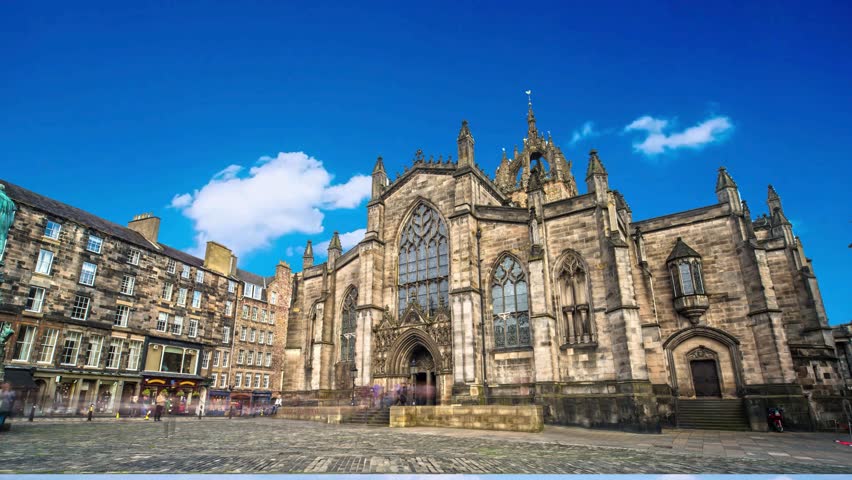EDINBURGH SCOTLAND MARCH 20: People on The Royal Mile is a succession of streets which form the main thoroughfare of the Old Town of the city of Edinburgh in Scotland on march 20, 2016EDINBURGH, circa 2016 - Wide angle shot of the St Giles Cathedral, Royal Mile, Edinburgh during the golden hour, Scotland, UKnight view of St Giles Cathedral in edinburghmile, great, statue, religious, britain, christianity, saint, st, sky, tower, cathedral, christian, british, facade, church, gothic, exterior, traditional, ancient, heritage, royal, travel, history, edinburgh, european, old, historic, famous, architecture, europe, landmark, uk, tourist, scotland, building, scottish, tourism, urban, people, street, city, town, cityscape, worship, culture, stone, religion, kingdom, medieval, giles
