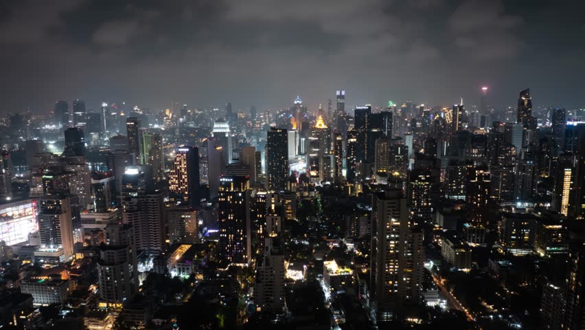 Bangkok timelapse shows city lights at night and busy urban life
