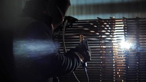 Welder welding steel rebar with arc sparks - Powered by Shutterstock - Get 15% off with code: PIKWIZARD15
