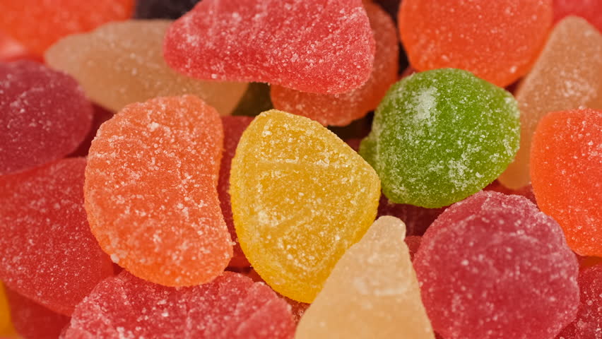 Fruit Jelly Gummy Candies close up, slider shot