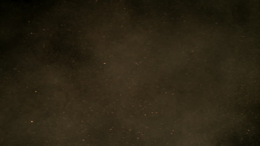 Freeze Motion Shot of Flying Sand Dust , Isolated on Black Background