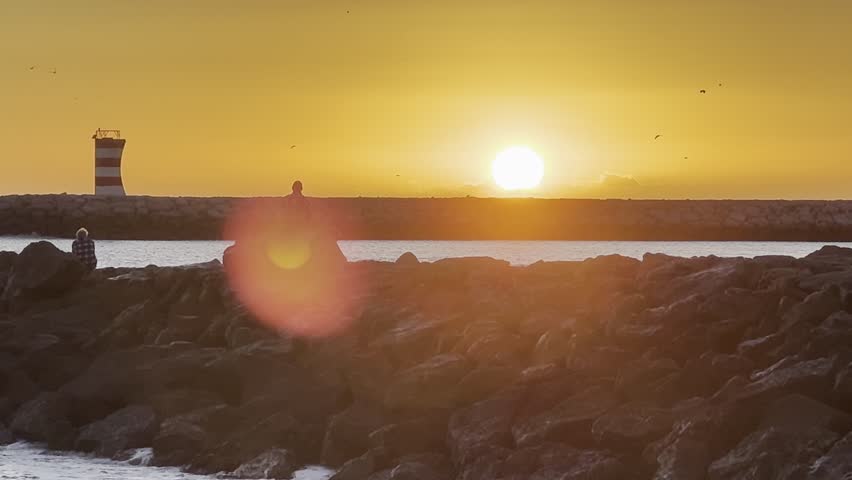 Beautiful sunrise dawn beach with waves, sand, sunrise sky gradually rising to the horizon. Seascape to relax the soul