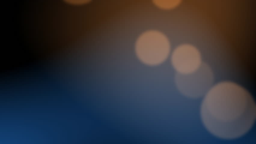 Abstract dark blue bokeh lights background. Soft gold defocused circles animation.

