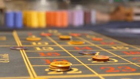 Closeup of a roulette table with bets and chips in a casino setting - Powered by Shutterstock - Get 15% off with code: PIKWIZARD15