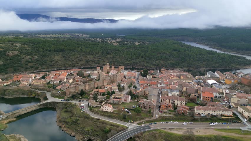 Impressive aerial view of the medieval city of Buitrago del Lozoya, a tourist spot in the Community of Madrid, Spain.