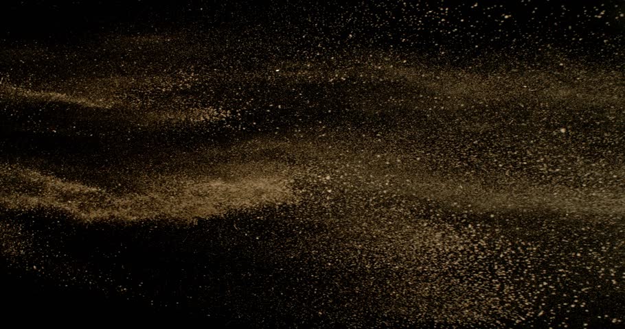 Super Slow Motion of Falling Brown powder, Dirt Soil in the Air. Filmed on High Speed Cinema Camera , 1000fps. Isolated on Black Background. Stripe Design.