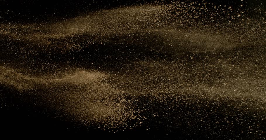 Super Slow Motion of Falling Brown powder, Dirt Soil in the Air. Filmed on High Speed Cinema Camera , 1000fps. Isolated on Black Background. Stripe Design.