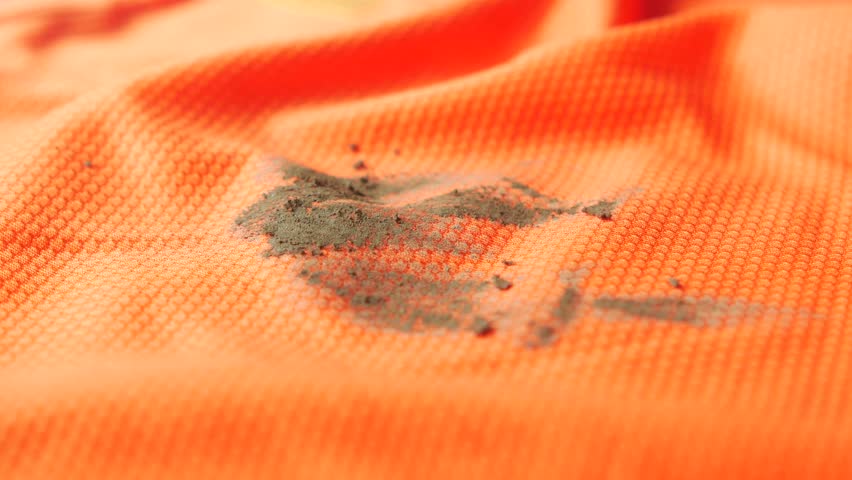 Removing dirt stains from orange fabric easily at home
