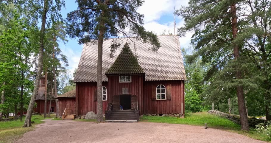 Karuna wooden church, oldest building inSeurasaari, from Sauvo at Seurasaari Open-Air Museum in summer, Helsinki, Finland.