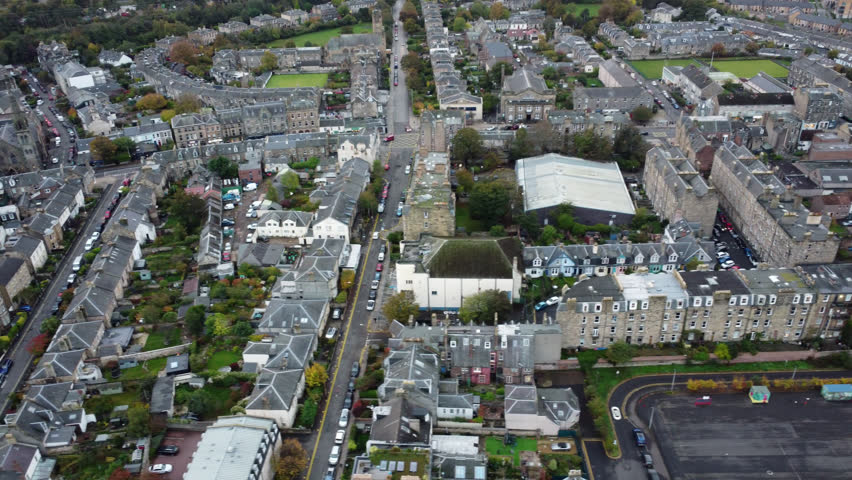 Drone panning shot of beautiful town of Edinburgh Scotland 