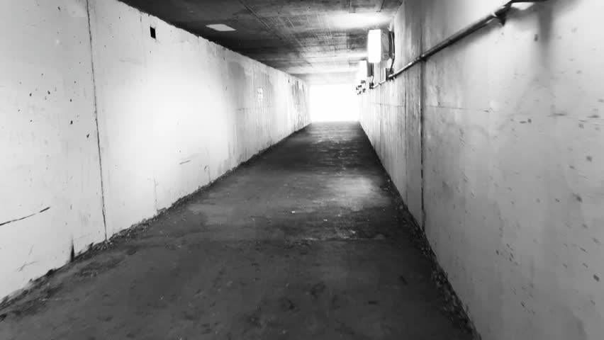 Light at the end of the tunnel, as seen walking through pedestrian underpass beneath Interstate 25 in Denver, between Yale and Hampden Avenues. 