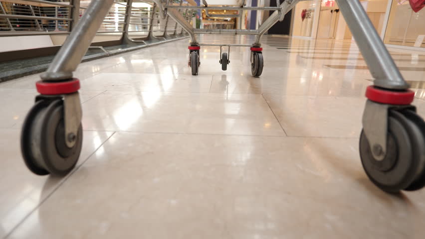 Shopping trolley at supermarket, low-angle shot