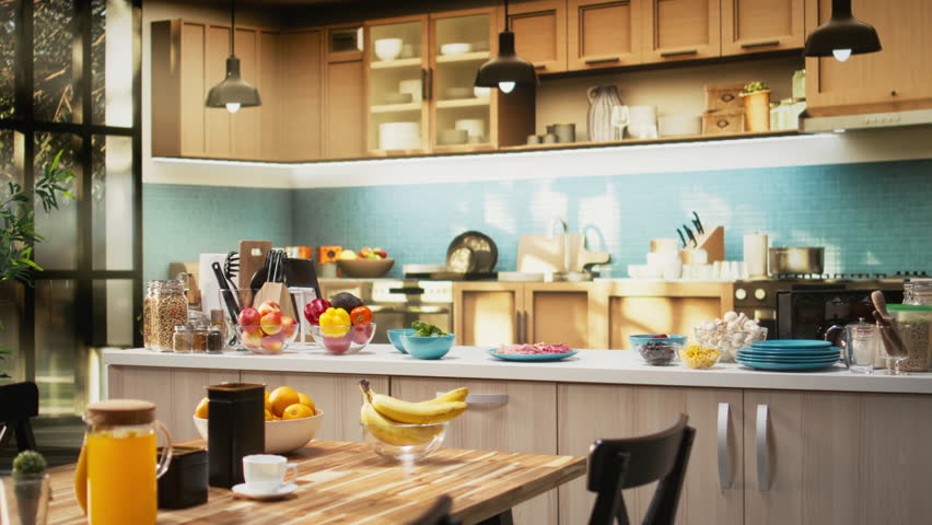 Comfortable kitchen setup with pizza ingredients on a modern countertop. Bowls of cheese, tomatoes and pepperoni sit beside spices and kitchenware, ready for a fun weekend activity of cooking.