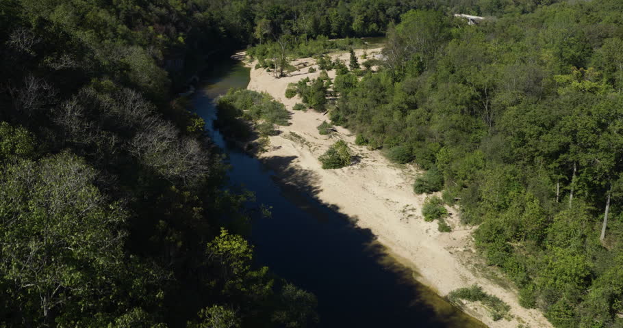 Low-Water Bridge Over The Upper North Fork River Near Devils Backbone Wilderness In Missouri, USA. Aerial Shot