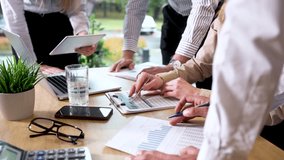 Business person analyzing financial statistics displayed on the tablet screen - Powered by Shutterstock - Get 15% off with code: PIKWIZARD15