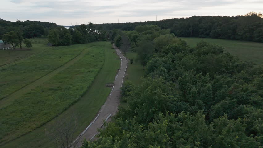 Footpath Leading To The Lake Flint Creek Near Gentry, Arkansas, United States. Aerial Shot