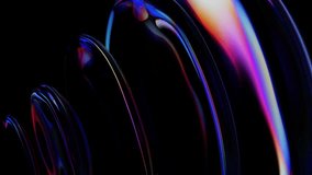 Abstract iridescent glass rings rippling with light dispersion and reflection on a black background. Seamless loop - Powered by Shutterstock - Get 15% off with code: PIKWIZARD15