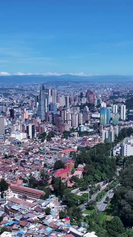 Bogota Skyline In Bogota Cundinamarca Colombia. Aerial View Of A Bustling City With High-Rise Buildings And Traffic. Business Sky Clouds Downtown Cityscape. Backgrounds Panoramic City.