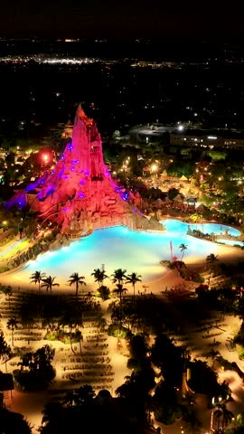 Night Volcano Bay In Orlando Florida United States. Aerial View Of Exciting Amusement Park Perfect For Family Fun. Building Illuminated Urban. Town Up Above. City Landmark. Orlando Florida.