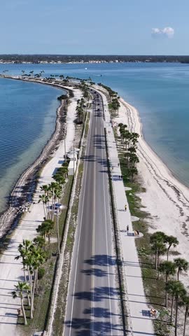 Honeymoon State Park In Clearwater Florida United States. Powerful Landscape Of The Vehicles In A Famous Road . Coast Clouds Seaside Summertime. Coast Panoramic. Clearwater Florida.