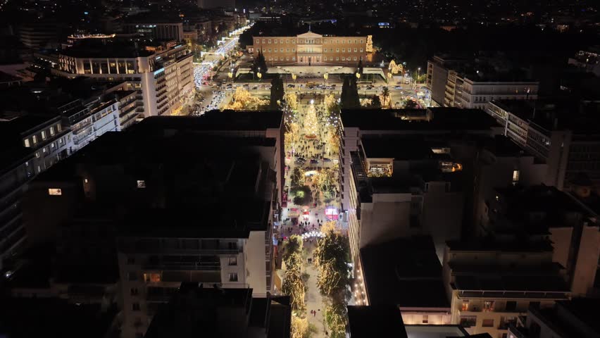 Aerial drone cinematic video of illuminated Syntagma square during New Year