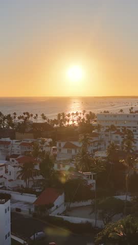 Sunset Sunrise Beach In Bavaro Punta Cana Dominican Republic. Aerial View Of Stunning Beach With Crystal Clear Waters. Sunrise Sky Clouds Beach Sea. Sunrise Beach City. Bavaro Punta Cana.