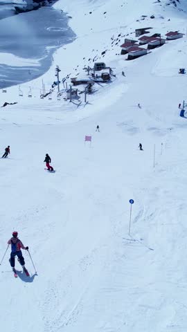Portillo Ski Station Centre In Andes Mountains Valparaiso Chile. Skier Skiing Downhill On Empty Ski Slopes In The Mountains. Nature Travel Destinations Snow Covered Forest Trees.