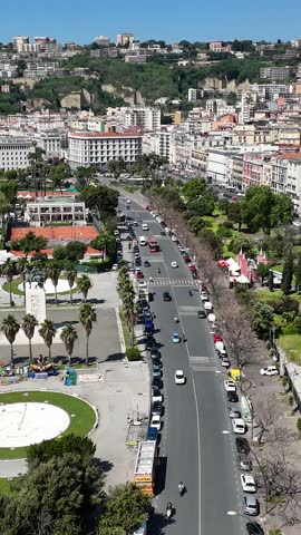 Villa Comunale Park In Naples Campania Italy. Aerial View Of A High-Rise Buildings And Traffic Showcasing Urban Life. Infrastructure Landscape Commercial Building Awesome.