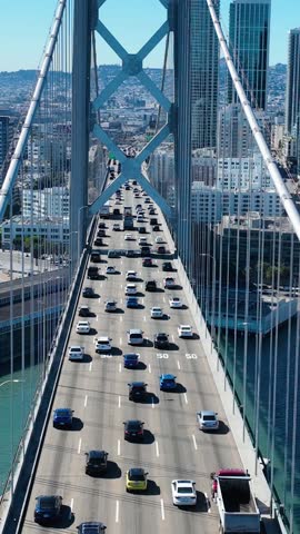 Oakland Bay Bridge In Oakland California United States. Traffic Is Moving Across A Modern Cable-Stayed Bridge. Metropolitan Landscape Panoramic City View Amazing. Urban Panoramic City View Town.