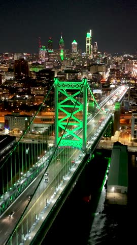 Benjamin Franklin Bridge In Philadelphia Pennsylvania United States. Cars Driving Towards Downtown City On The Famous Bridge. Night Road Downtown Cityscape. Night Panorama.