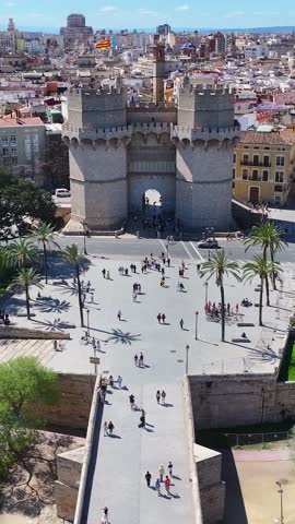 Serranos Towers In Valencia Spain. Aerial View Of A High-Rise Buildings And Traffic Showcasing Urban Life. Town Sky Background Backgrounds Urban. Town Outdoors Panoramic City. Valencia Spain.