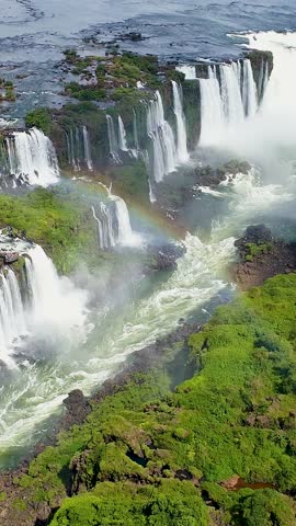 Iguazu Falls In Foz Do Iguacu Parana Brazil. Aerial View Of A River Surrounded By Lush Green Tropical Rainforest. Nature Sky Mountain Canyon. Nature Outdoors Waterfall Panoramic Florest.