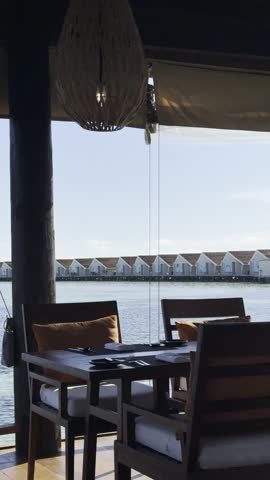 Enjoying eating breakfast on a floating restaurant in a lagoon in the maldives