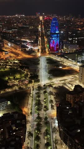 Barcelona Skyline In Barcelona Catalonia Spain. Bustling Downtown Cityscape With Modern Buildings. Night Highway Road Downtown Cityscape. Night Downtown Panorama. Barcelona Catalonia.