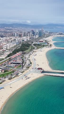 Barceloneta Beach In Barcelona Catalonia Spain. Aerial View Of A Bustling City With High-Rise Buildings And Traffic. Paradise Landscape Leisure Beautiful. Leisure. Barcelona Catalonia.