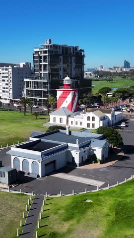 Green Point Lighthouse In Cape Town Western Cape South Africa. Iconic Structure Of The Historic Lighthouse In A Coastal City. Shore Sky Beach Sea. Outside Beach Panning Wide. Cape Town Western Cape.