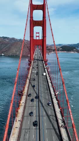 Golden Gate Bridge Aerial In San Francisco California United States. Bridge Showcasing The Traffic Flowing Across In The City. Business Sky Downtown Cityscape. Outdoors Downtown Up Above.