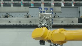 Demo of Industrial robotic arm with vacuum gripper operating on automated production line. Advanced factory robotic arm automation precision system. Smart manufacturing technology industry processes - Powered by Shutterstock - Get 15% off with code: PIKWIZARD15