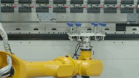 Demo of Industrial robotic arm with vacuum gripper operating on automated production line. Advanced factory robotic arm automation precision system. Smart manufacturing technology industry processes - Powered by Shutterstock - Get 15% off with code: PIKWIZARD15