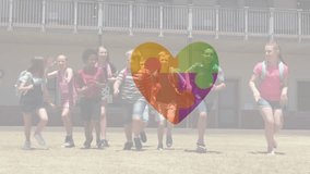 Animation of puzzle pieces with heart icon over diverse schoolchildren. Autism awareness month concept digitally generated video. - Powered by Shutterstock - Get 15% off with code: PIKWIZARD15