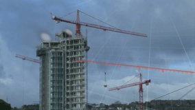 The video shows various statistical and financial data being processed against a construction site in the background. The data includes information on construction progress, costs, and other financial - Powered by Shutterstock - Get 15% off with code: PIKWIZARD15