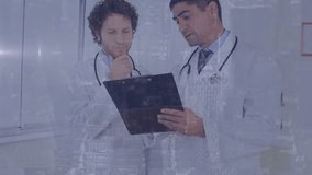 Animation of covid-19 data processing over two diverse male doctors discussing at hospital. Medical healthcare and covid-19 pandemic concept - Powered by Shutterstock - Get 15% off with code: PIKWIZARD15